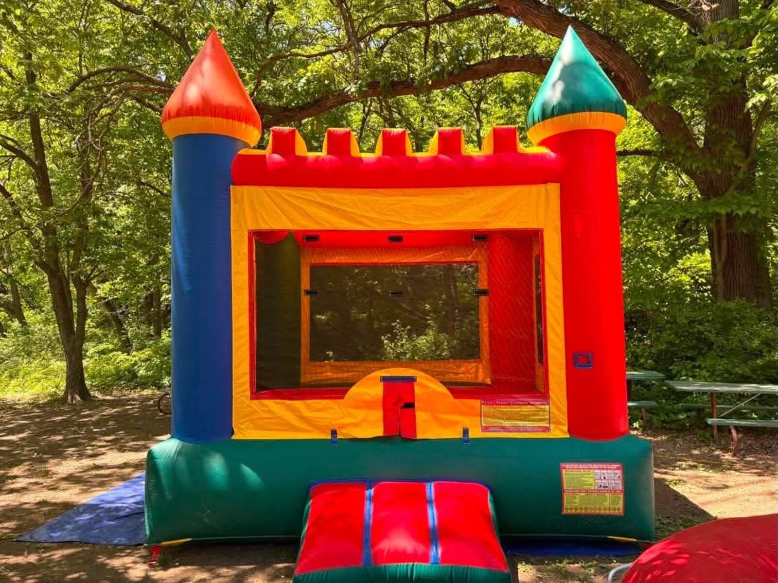 Castle Bounce House set up at an event — photo 2
