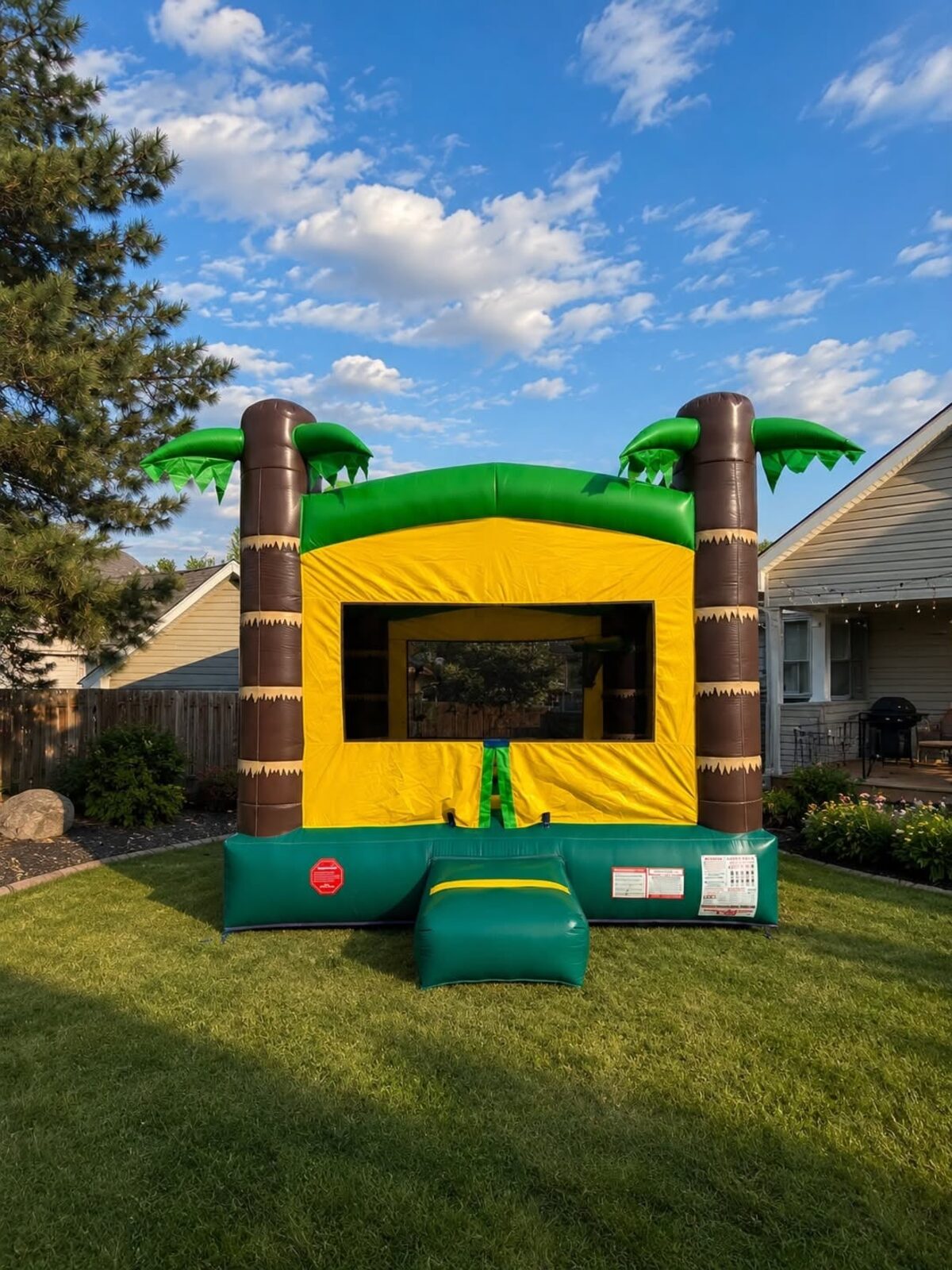 Palm tree bounce house in a Siouxland backyard
